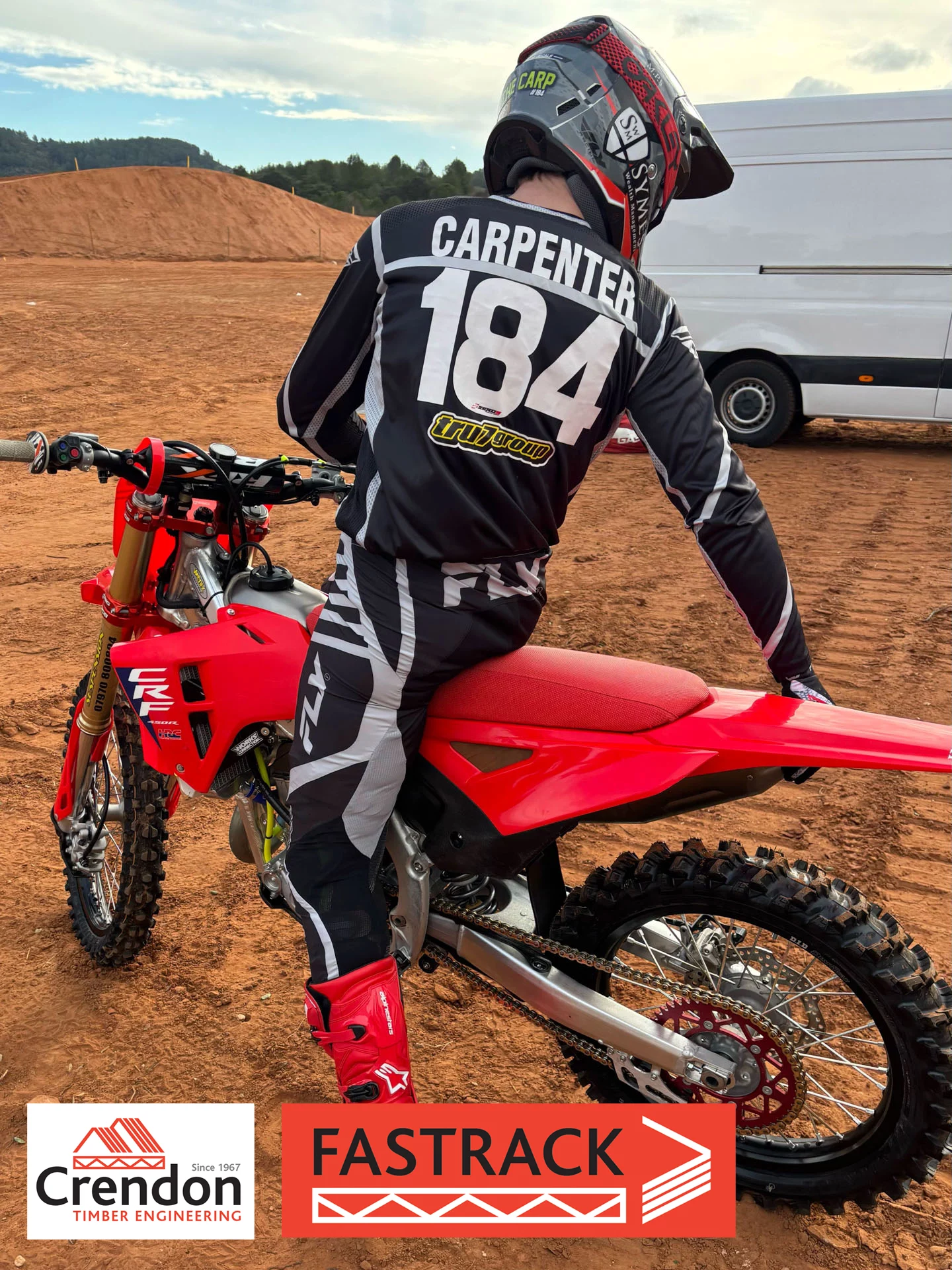 Carpenter on a motorcross bike.